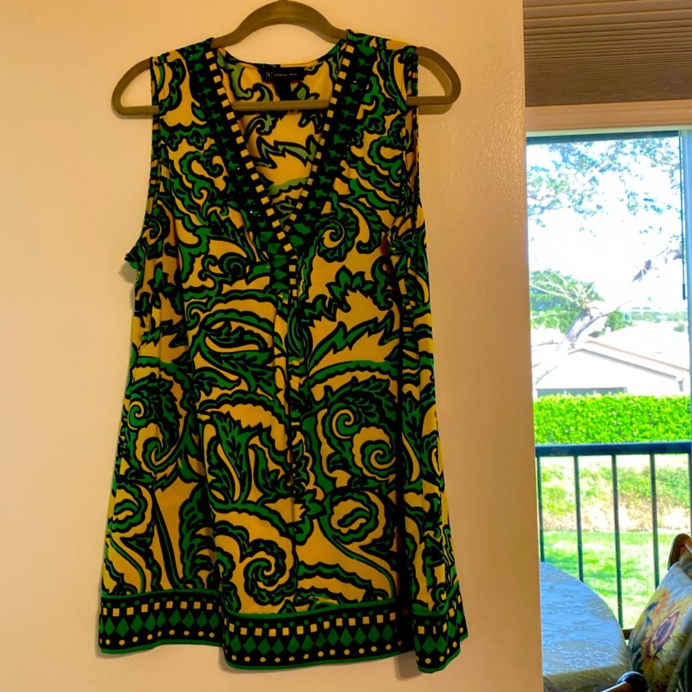 Yellow, green and black top with black beads adorning v-neck